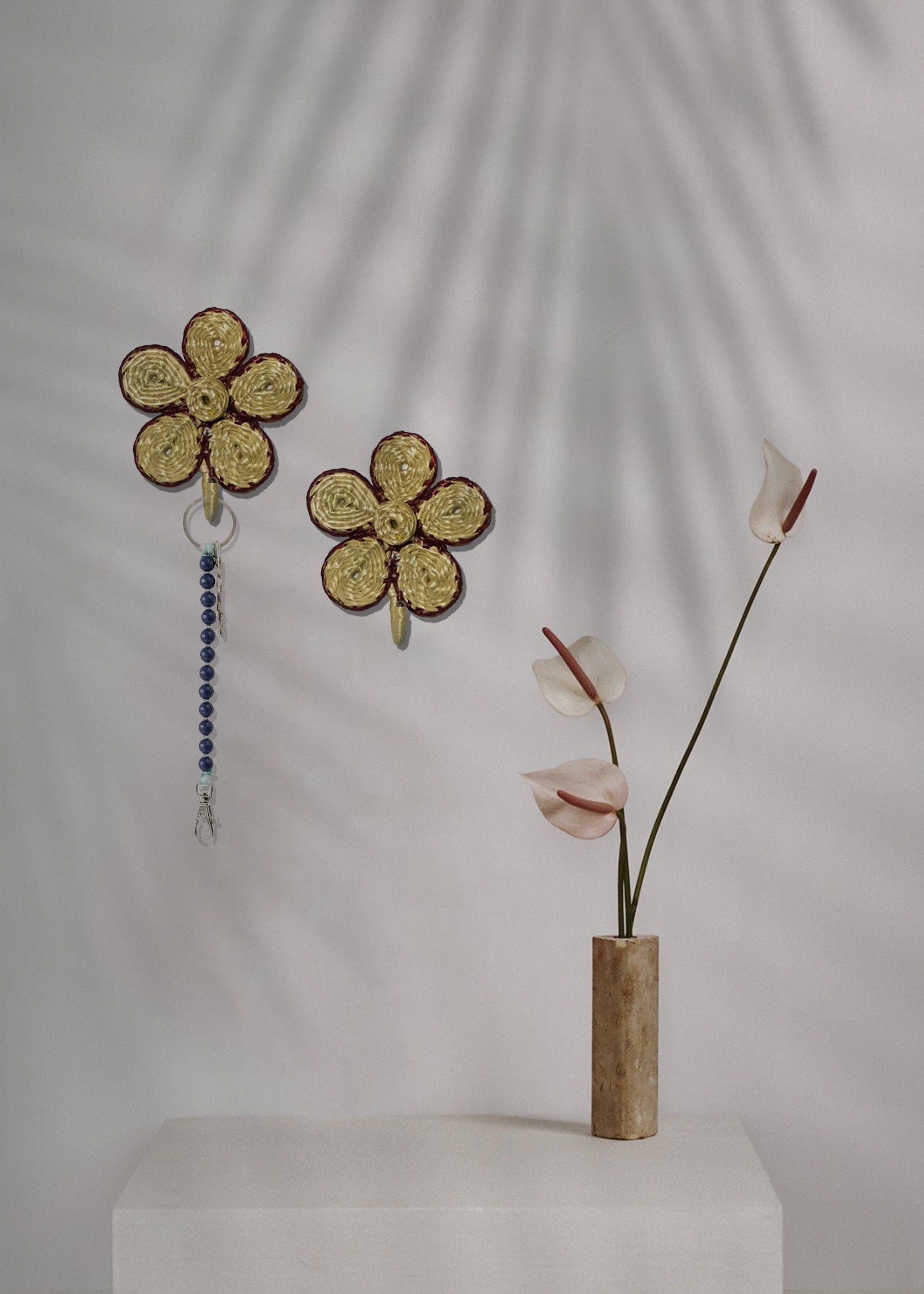 Sikki flower shaped hook is hung on the wall