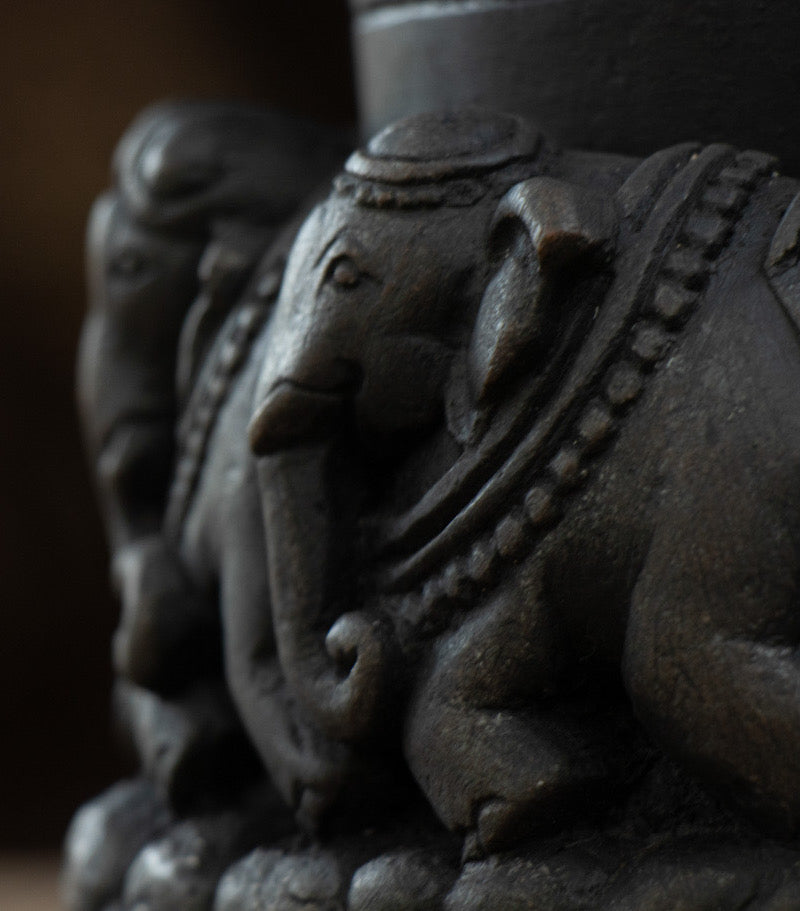 close up of Black stone hand carved candle light in the shape of elephant