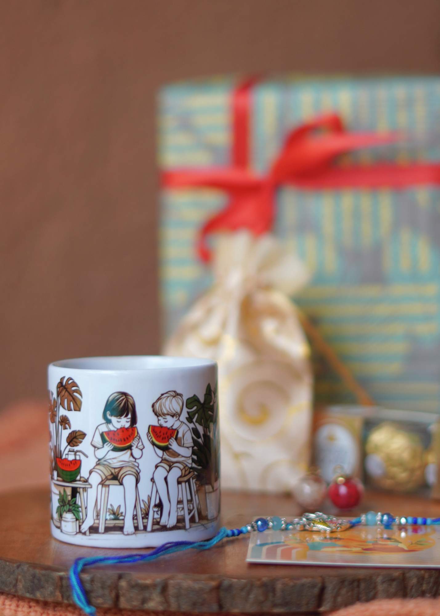 Garmi ki Chutti Cup & Coaster Rakhi Hamper